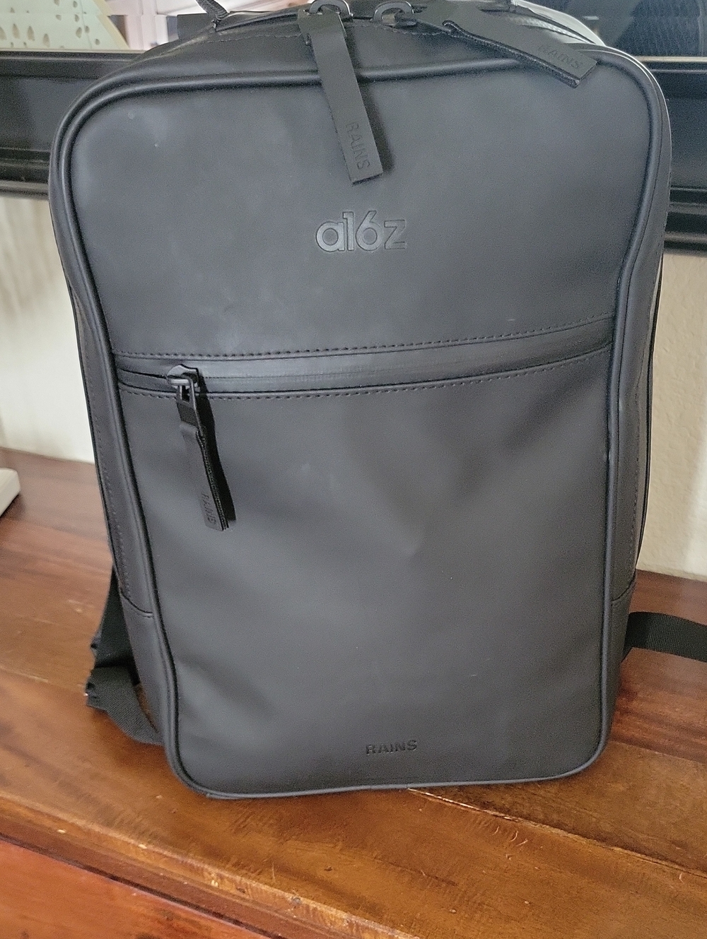 Rains Black Minimalist Waterproof Backpack